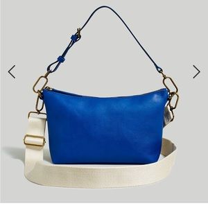 The Leather Carabiner Crossbody Sling Bag in bluestone